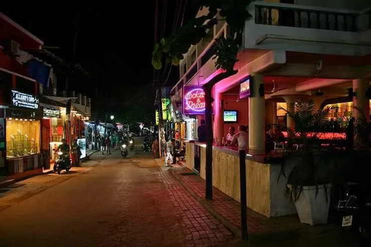 Bustling Tito’s Lane in Baga, Goa, lit up with vibrant nightlife and music venues