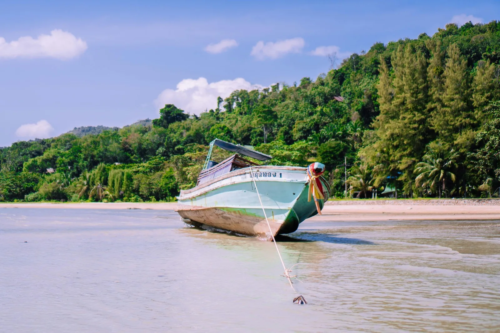 Long-tail boat on the shore of Koh Yao Noi, Thailand.