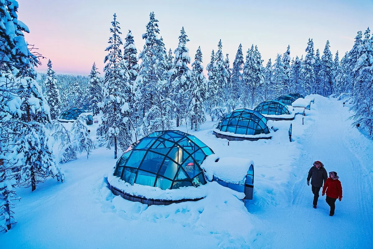 Glass igloo stay beneath the Northern Lights in the Arctic