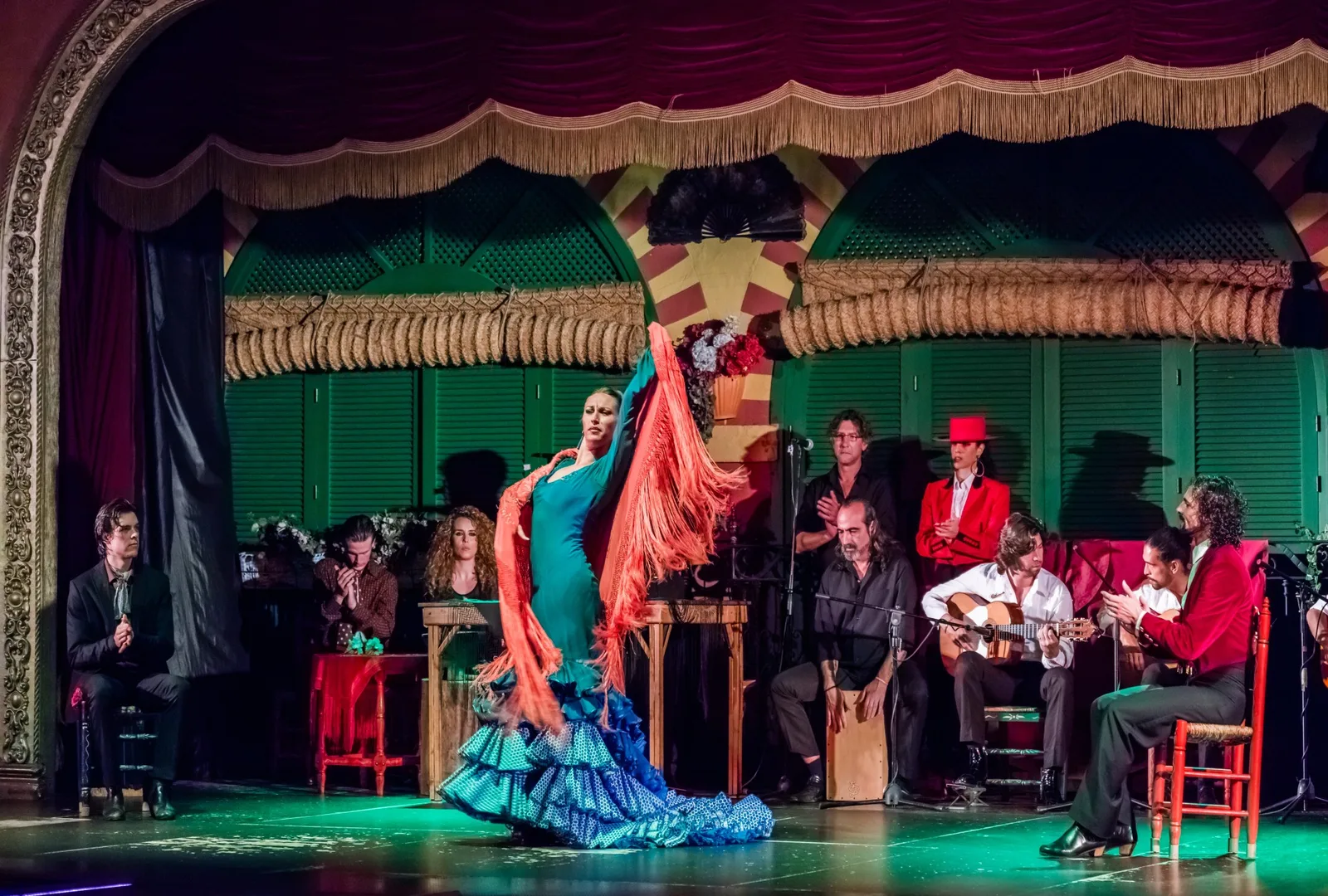 A vibrant flamenco dancer performing passionately, highlighting Seville, Spain's rich cultural heritage