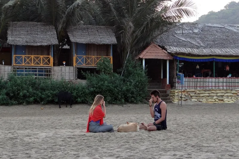 Gokarna , Spiritual villages in India, couple doing yoga at beach